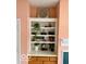 Close up of beautiful built in shelving with decorative elements and storage at 8002 Windham Lake Way # 33, Indianapolis, IN 46214