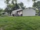 Large backyard with deck offering plenty of space for outdoor enjoyment and entertaining at 802 Suwanee Ct, Indianapolis, IN 46217