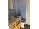 Functional bathroom features a single sink vanity and a toilet at 802 Suwanee Ct, Indianapolis, IN 46217