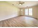 Spacious living room features laminate flooring, ample natural light, and a warm and inviting atmosphere at 817 Delray Dr, Indianapolis, IN 46241