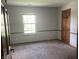 Bedroom features neutral paint, carpeted floor, natural light and a closet at 8234 Crosser Dr, Indianapolis, IN 46237