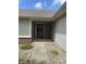 Welcoming front entrance with a covered porch and low-maintenance landscaping for added curb appeal at 8234 Crosser Dr, Indianapolis, IN 46237