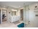 Spacious bathroom with double vanity, walk-in shower, and contemporary design at 8316 Thorn Bend Dr, Indianapolis, IN 46278