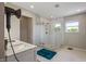 Modern bathroom featuring a glass shower, marble vanity, and stylish accents at 8316 Thorn Bend Dr, Indianapolis, IN 46278