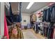 Spacious walk-in closet with custom shelving and ample storage space for clothes and accessories at 8316 Thorn Bend Dr, Indianapolis, IN 46278