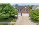 Beautiful brick two-story home with a well-manicured lawn and a spacious two-car garage at 8316 Thorn Bend Dr, Indianapolis, IN 46278