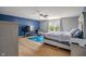 The primary bedroom offers plenty of space, large windows, hardwood floors, and natural light at 8316 Thorn Bend Dr, Indianapolis, IN 46278