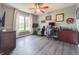 Home office or bedroom space with natural light, modern furnishings, and ample desk space at 8798 Surrey Dr, Pendleton, IN 46064