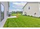 Spacious backyard with lush green grass and ample room for outdoor entertaining at 900 Sunchaser Rd, Lebanon, IN 46052