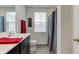 Bathroom with a single sink vanity, a shower with curtain, and natural light from the window at 900 Sunchaser Rd, Lebanon, IN 46052