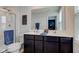 This bathroom features double sinks, dark cabinets, and a glass enclosed shower at 900 Sunchaser Rd, Lebanon, IN 46052