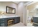 Bathroom featuring vanity with drawers, toilet, and separate shower with neutral walls and tile at 9317 Muir Ln, Fishers, IN 46037