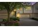 Charming townhome showcasing a well-maintained front yard and inviting entrance with a garage at 9317 Muir Ln, Fishers, IN 46037