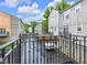 Balcony view of the neighboring townhomes from a wrought iron balcony at 952 Junction Pl, Indianapolis, IN 46220