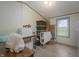 Bedroom with a window that provides natural light and plenty of storage at 9621 N County Road 25 W, Muncie, IN 47303