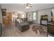 A cozy living room with light-colored walls and wood-look flooring at 9621 N County Road 25 W, Muncie, IN 47303
