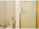 Bathroom with a gold framed shower and toilet at 9955 Orange Blossom Trl, Fishers, IN 46038
