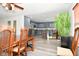 Open kitchen and dining area with stainless steel appliances and a center island offers style and function at 9955 Orange Blossom Trl, Fishers, IN 46038