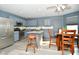 Modern kitchen with stainless steel appliances and center island, perfect for cooking and entertaining at 9955 Orange Blossom Trl, Fishers, IN 46038