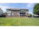 This home has a sprawling green backyard with a patio, perfect for outdoor entertaining and relaxation at 10267 Ranford Blvd, Fishers, IN 46040