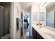 The bathroom features double sinks, a large mirror, great lighting and plenty of storage at 10267 Ranford Blvd, Fishers, IN 46040