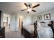 Comfortable bedroom with a ceiling fan and great natural light, with access to a full bathroom at 10267 Ranford Blvd, Fishers, IN 46040