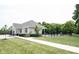 Exterior of community clubhouse featuring a pool area and well-maintained lawn at 10267 Ranford Blvd, Fishers, IN 46040