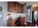 Desk area with built-in cabinets, drawers, granite countertop and stainless appliances at 10267 Ranford Blvd, Fishers, IN 46040