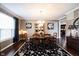 Charming dining area with wooden table set and decoratively patterned rug at 10267 Ranford Blvd, Fishers, IN 46040