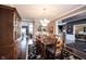 Dining room with wood table and chairs, view of entry and staircase at 10267 Ranford Blvd, Fishers, IN 46040