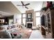 Open concept living room with high ceilings, fireplace, and lots of natural light at 10267 Ranford Blvd, Fishers, IN 46040