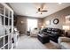 Cozy living room with neutral decor and plush furnishings at 10267 Ranford Blvd, Fishers, IN 46040
