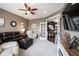 Comfortable living room with ceiling fan and french doors at 10267 Ranford Blvd, Fishers, IN 46040