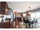Open-concept design showcases kitchen, dining area, and hardwood floors throughout the living space at 10267 Ranford Blvd, Fishers, IN 46040