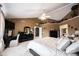 Large main bedroom featuring vaulted ceiling, vanity table, and a door leading to the main bathroom at 10267 Ranford Blvd, Fishers, IN 46040
