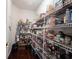 Spacious pantry featuring wire shelving and organized food storage containers at 10267 Ranford Blvd, Fishers, IN 46040