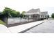 Exterior view of a community pool, surrounded by a fence and well-maintained landscaping at 10267 Ranford Blvd, Fishers, IN 46040