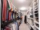 Spacious walk-in closet with custom shelving, hanging rods, and ample storage for clothes and accessories at 10267 Ranford Blvd, Fishers, IN 46040