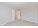 Bright bedroom with carpet, closet, and doorway to bonus room at 10307 Gateway Dr, Brownsburg, IN 46234