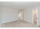 Neutral bedroom offers plush carpeting, neutral paint, and a walk in closet at 10307 Gateway Dr, Brownsburg, IN 46234
