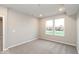 Bedroom with two windows and carpeted floors at 10307 Gateway Dr, Brownsburg, IN 46234