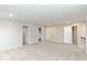 Open bonus room with carpet flooring and access to multiple rooms at 10307 Gateway Dr, Brownsburg, IN 46234
