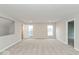 Large bonus room with carpet and view to closet and doorway at 10307 Gateway Dr, Brownsburg, IN 46234