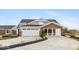 Charming exterior features a brick and light gray finish with attached garage at 10307 Gateway Dr, Brownsburg, IN 46234