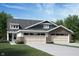 Charming two-story home featuring a brick facade, two-car garage, and neutral color palette at 10307 Gateway Dr, Brownsburg, IN 46234