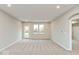 Spacious living room with plush carpeting, recessed lighting, and plenty of natural light at 10307 Gateway Dr, Brownsburg, IN 46234
