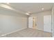 Spacious main bedroom featuring neutral walls, plush carpet, and walk-in closet at 10307 Gateway Dr, Brownsburg, IN 46234