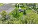This is an aerial view of a home with a gazebo, shed, long driveway, and expansive lawn at 10363 N County Road 950 E, Brownsburg, IN 46112