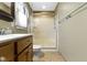The bathroom features tile floors, vanity with sink, and a shower at 10363 N County Road 950 E, Brownsburg, IN 46112