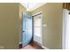 Interior view of the entryway with blue door and a glimpse of the exterior at 10363 N County Road 950 E, Brownsburg, IN 46112